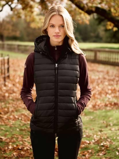 Woman wearing a black puffer vest