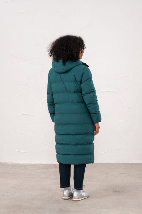 Person wearing a teal puffer coat 